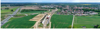Obr. 01 Pohled na výstavbu Zvěrotického železničního tunelu a jeho situování v krajině 